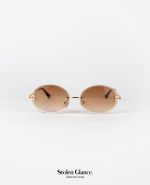 Gafas de sol marco dorado lente degradado marron